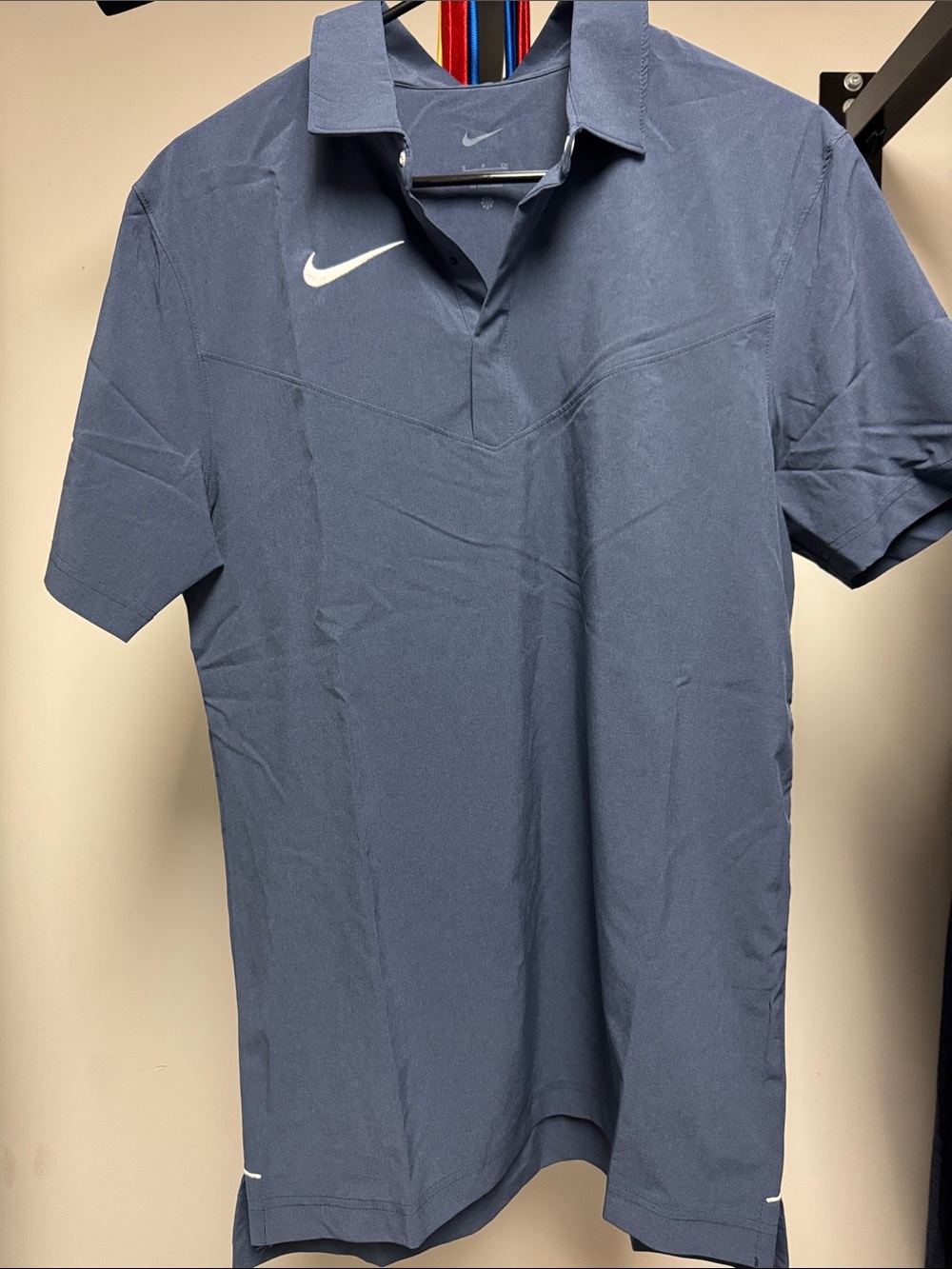 Nike Men’s Navy Blue Polo with White Swoosh